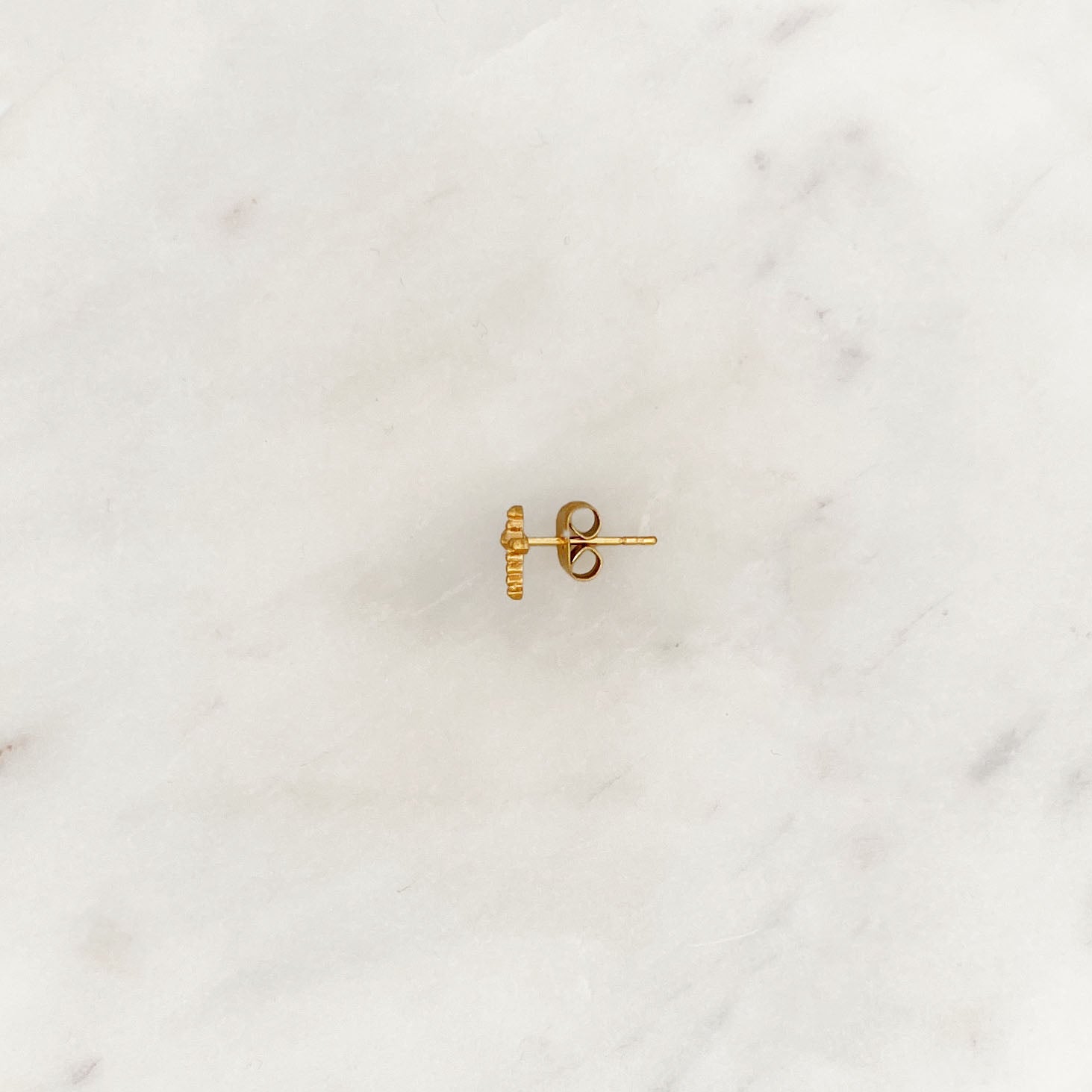 Earstud cross