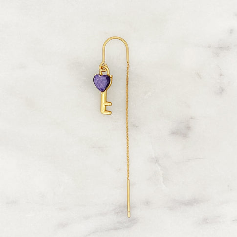 Voorbeeld van een lange ketting met lila liefdessleutel